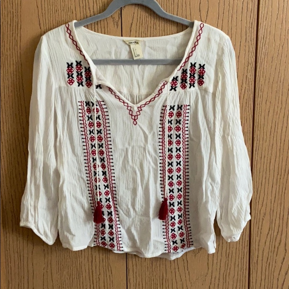 Embroidered blouse.
